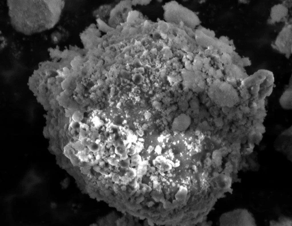 Cropped grayscale particle surface detail for technology review